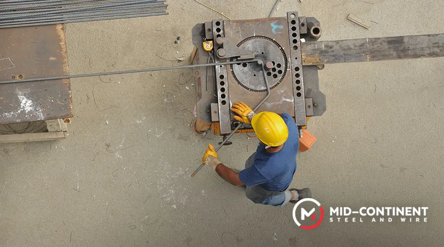 Long pieces of steel in the bending process